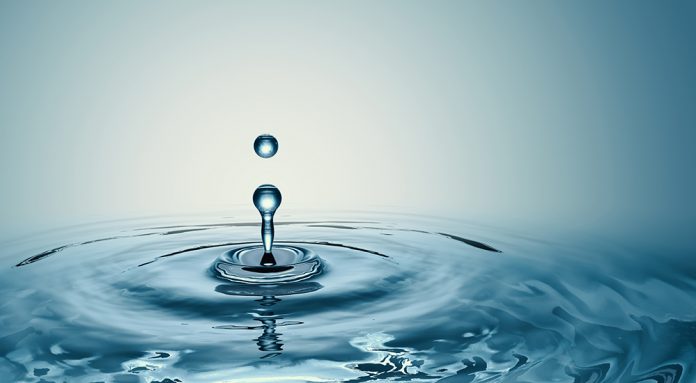 Clear Water drop with circular waves