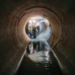 Sewer,Tunnel,Workers,Examines,Sewer,System,Damage,And,Wastewater,Leakage