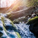 water flowing over rocks