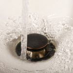 Water going down sink drain